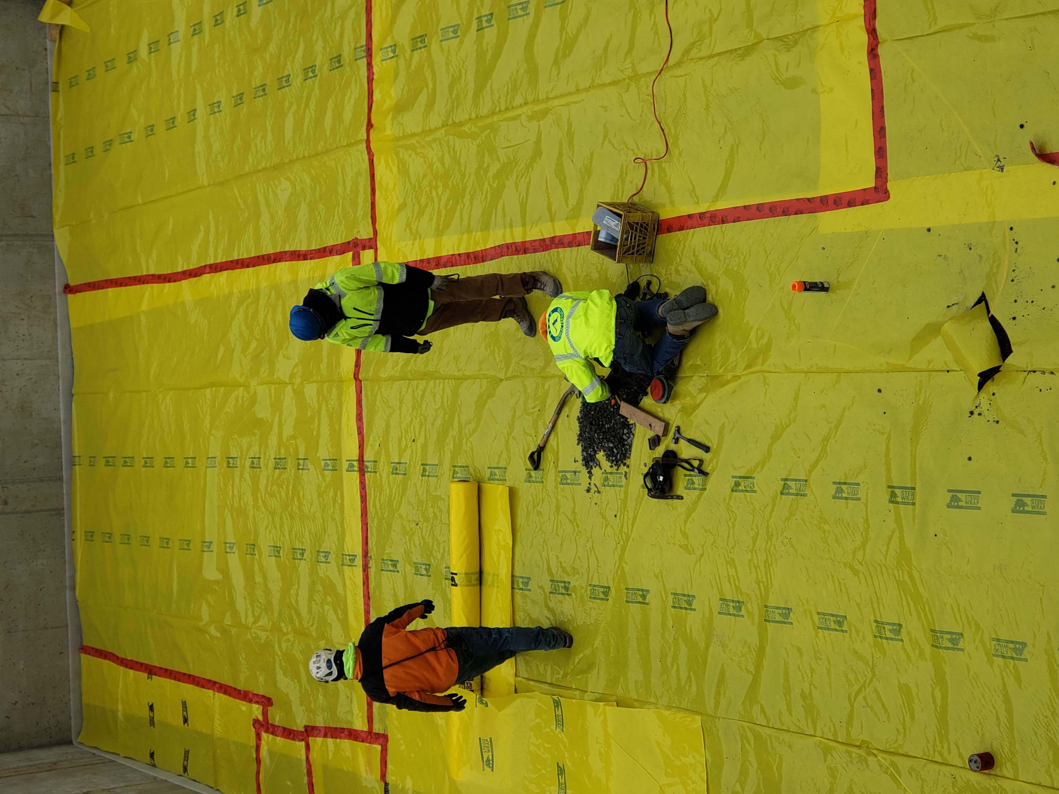 Below-slab vapor barrier installation