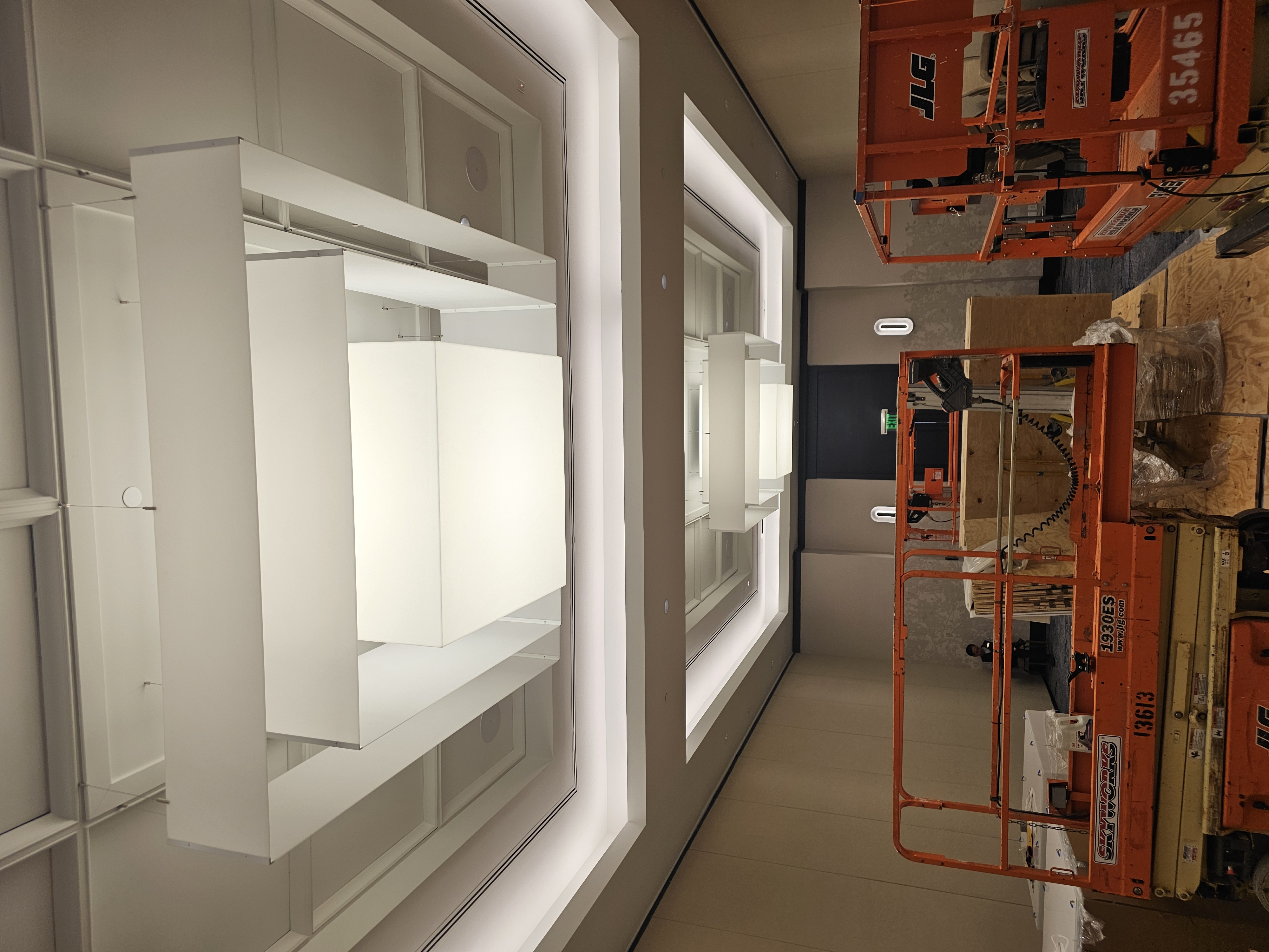 Ballroom with custom suspended luminaire panels